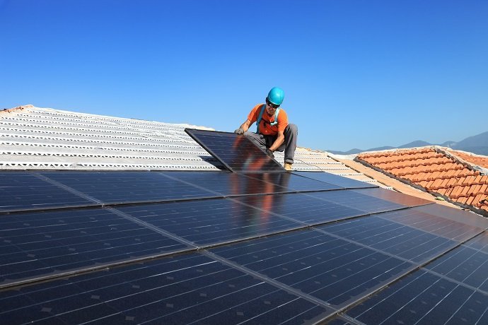 installing alternative energy photovoltaic solar panels