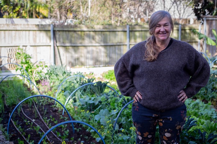 Abi Byrne posing in an urban garden